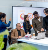 Group of business men and women with multiethnic and multigeneration discuss in the conference room to get the success of the project.